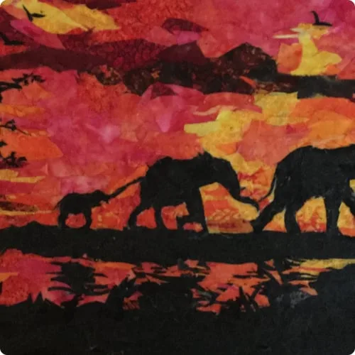 Elephants at Sunset